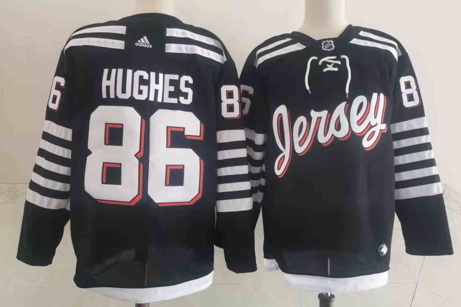 2022 New Jersey Devils new uniform makes on-ice debut Men's New Jersey Devils #86 Jack Hughes Black Alternate Authentic Jersey